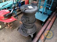 Pot belly stove with pipes