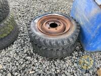 2 old trailer wheels