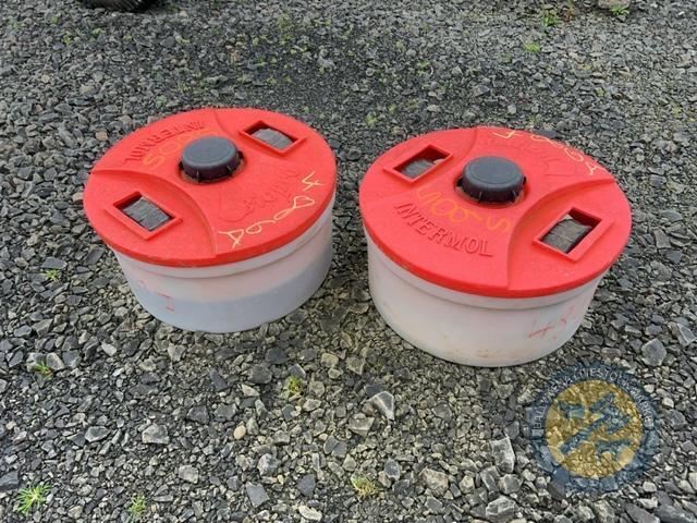 2 cattle lick tubs