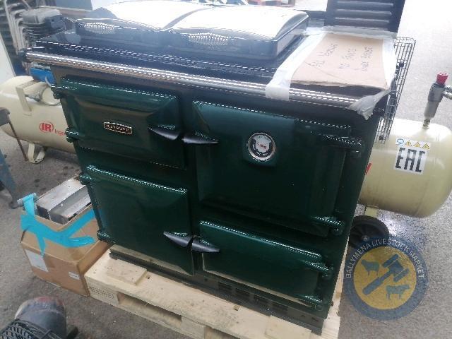 Double burner Rayburn oil cooker heats 16 radiators & flu fittings & service details