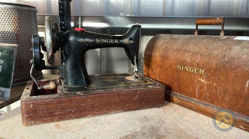 Singer sewing machine in box