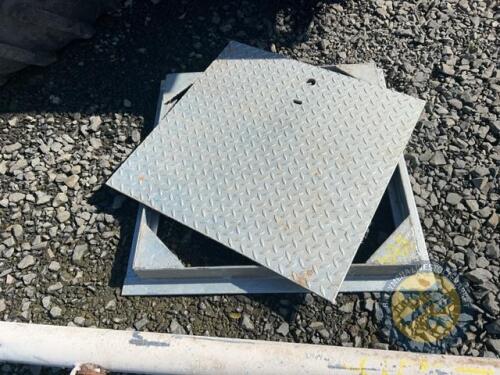 Manhole surround with cover