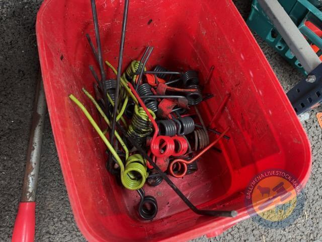 Red bucket of tines