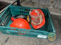 Green trolly of hard hats & ear muffs