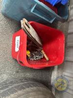 Red bucket of chainsaw blades ect