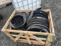 Crate of plastic man hole covers - 2