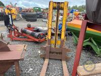 yellow tractor forklift mast