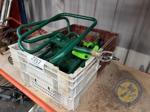 Box with folding garden hose reel