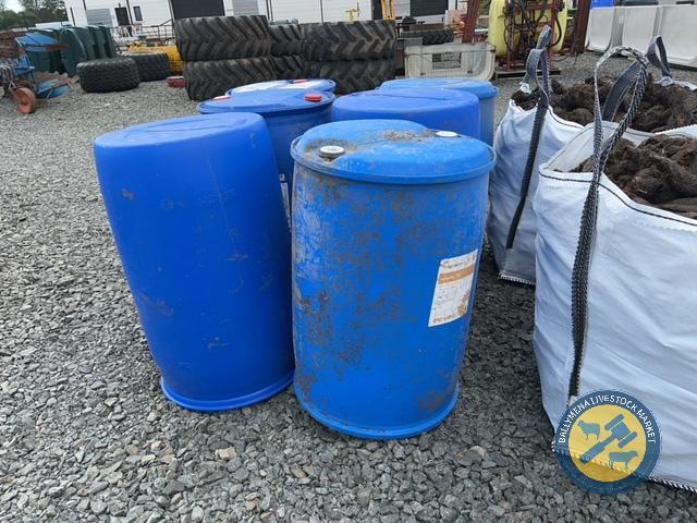 6 blue plastic barrels